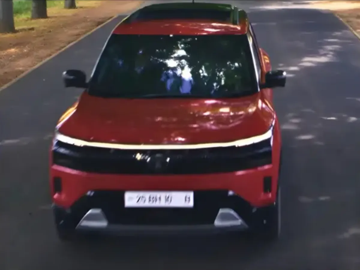 New Tata Sierra Teased in Bold Red with Triple-Screen Dash